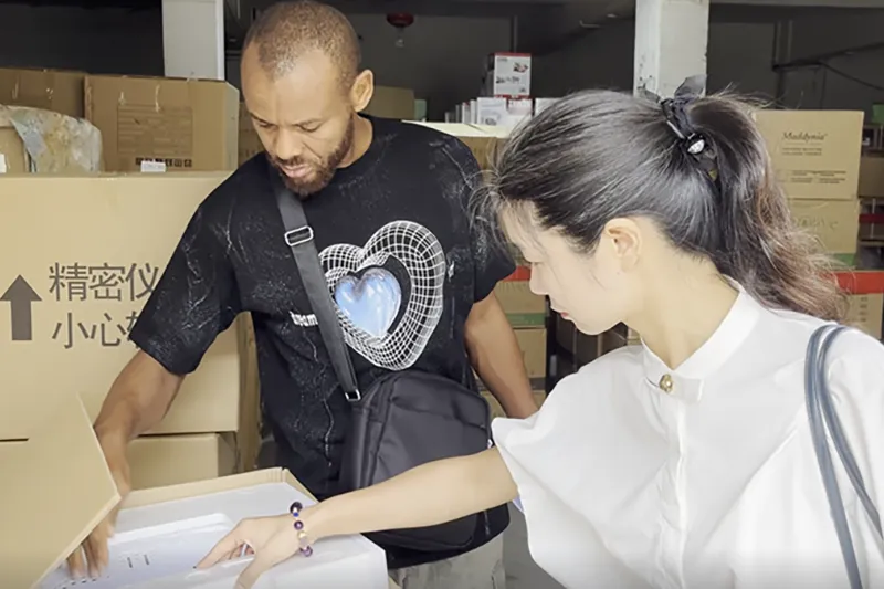 African importer consulting with a logistics expert about shipping documents and customs clearance strategies